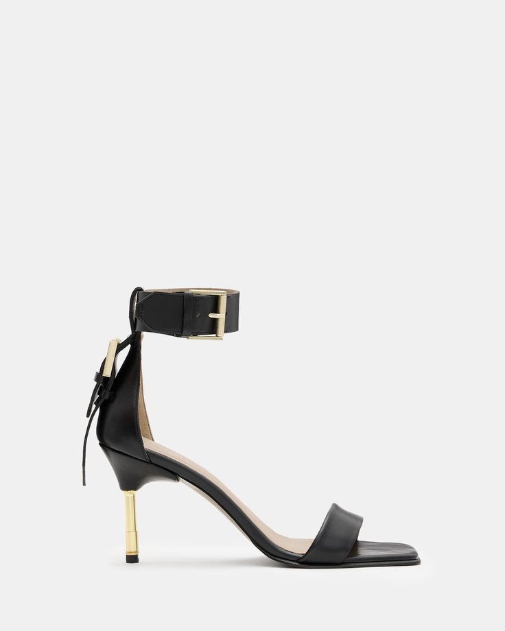 A minimal moment. The Noir are for night-time dressing. Square toe with a metal heel – pair them with your favorite dress.  If you are between sizes, we recommend sizing up Heeled sandals Buckle closure Square toe Ankle strap Metal heel AllSaints branded washer Embossed logo details Mid-height heel Square Toe Heels, Black Sandals Heels, Heeled Sandal, Leather Belts, Denim Outfit, Favorite Dress, Embossed Logo, Heeled Sandals, All Saints