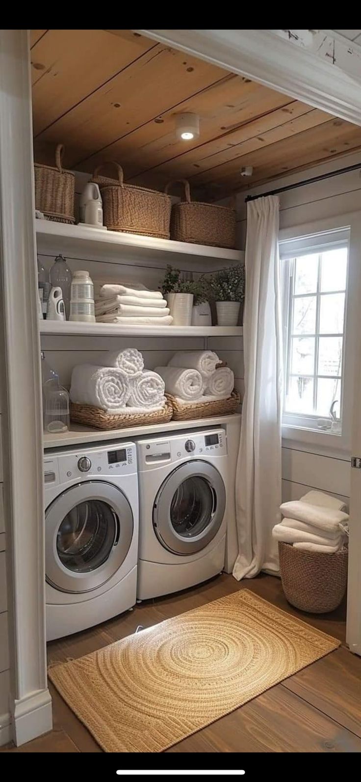 a washer and dryer in a small room