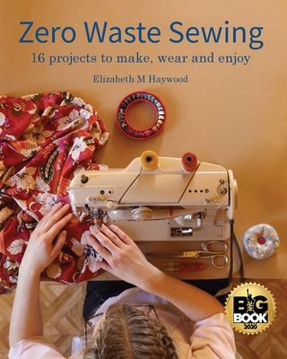 a woman is working on an old sewing machine in front of a sign that reads, zero waste sewing 16 projects to make, wear and enjoy