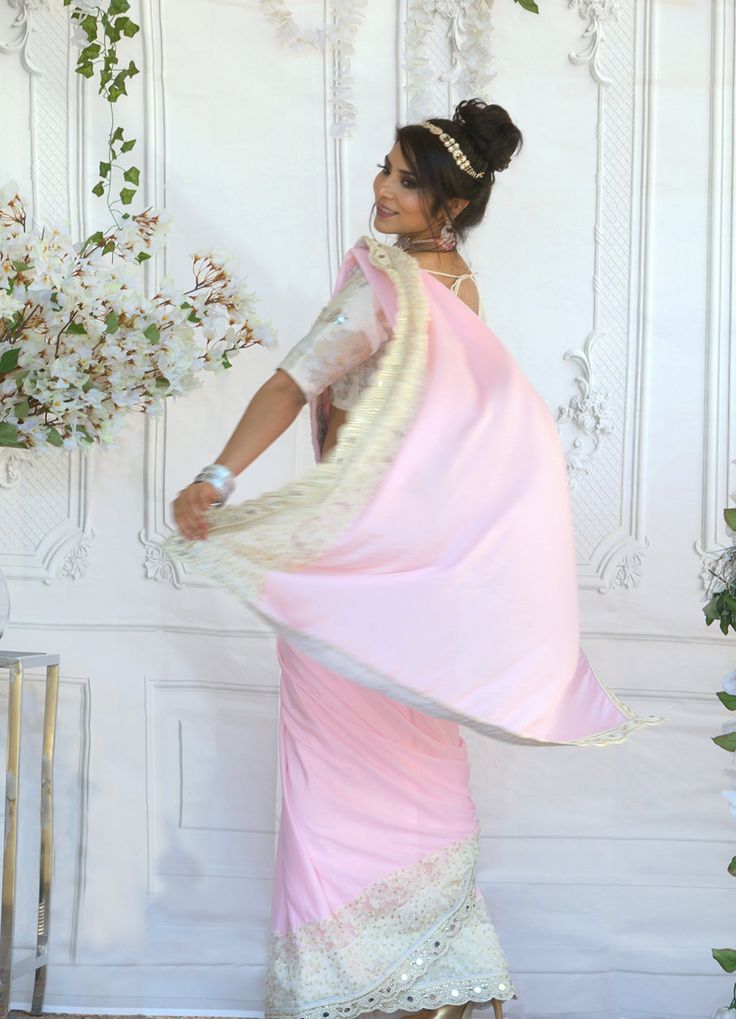 Since time immemorial, pink saree has been a perfect garment that has always reflected a woman’s beauty and elegance! This figure flattering Chiffon saree can be worn as a trendy saree. Fabric & Work Style -- Chiffon saree- Ivory Blouse has beautiful Embossed Print. Size 34-38 Details -- Assured quality.- Wash care instruction: Dry clean only.- Slight variation in color is possible due to digital photography. Indian Bridal Couture, Trendy Saree, Elegant Sarees, Indian Clothing Store, Bridal Packages, Celebrity Closet, Fabric Work, Ivory Blouse, Trendy Sarees