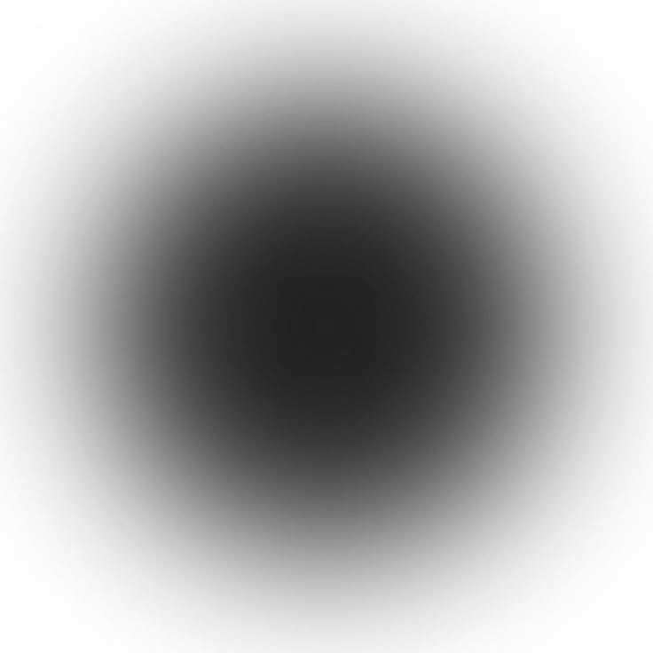 an abstract black and white background with a circular design in the center, as if it were blurred or blurry