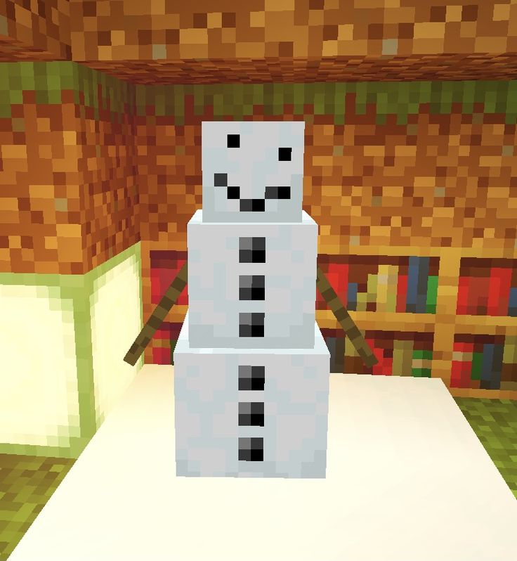 an image of a snowman made out of cubes in the middle of a room