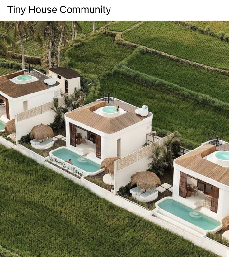 an aerial view of a house with two hot tubs in the middle of it