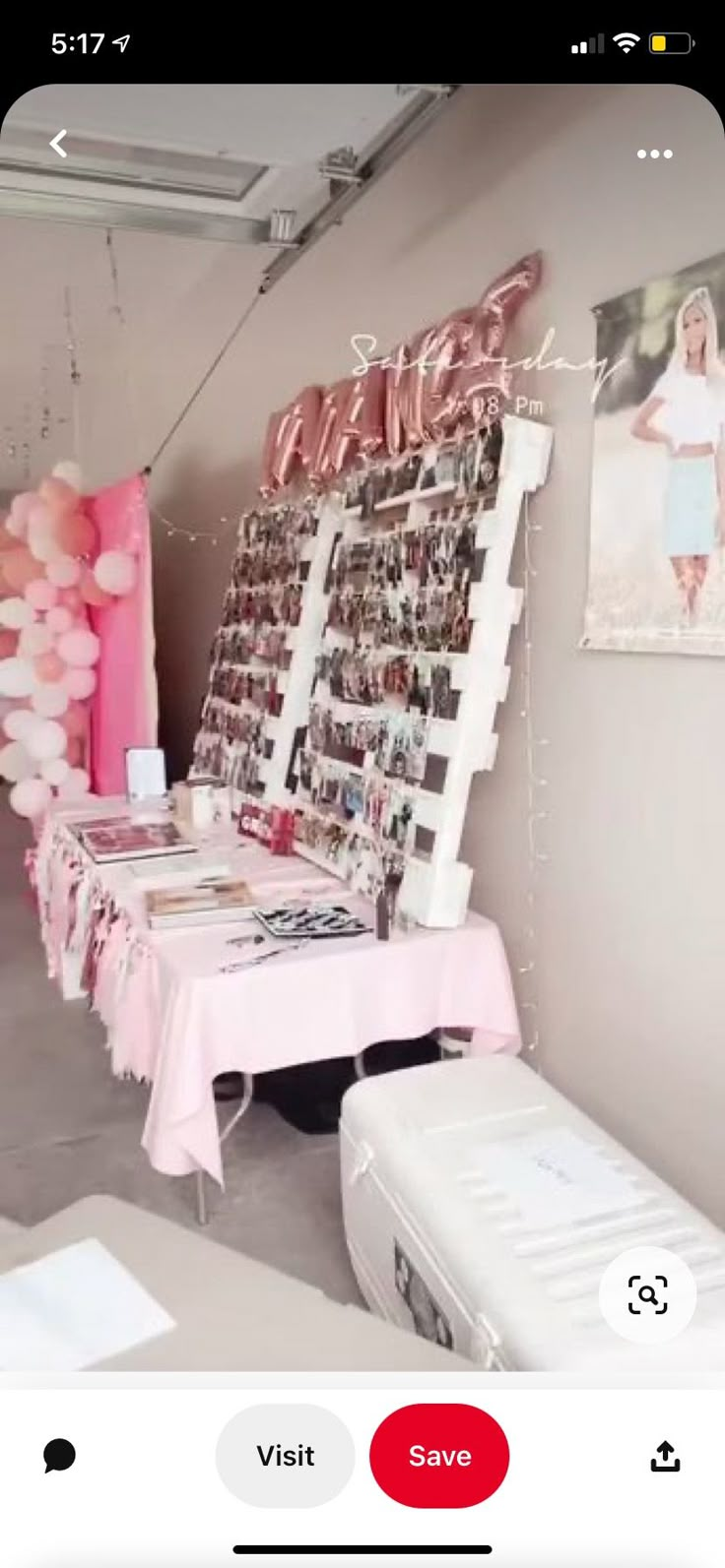 a table with balloons and pictures on it in a room that is decorated for a woman's birthday