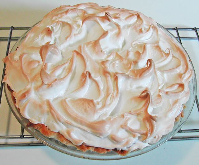 a pie sitting on top of a cooling rack