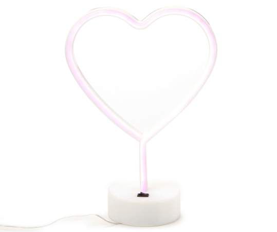 a heart shaped neon light on a white surface with a cord attached to the end