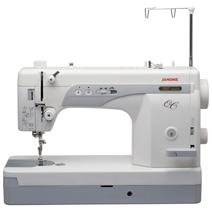 the janome sewing machine is white and has buttons on each side, which can be used to sew