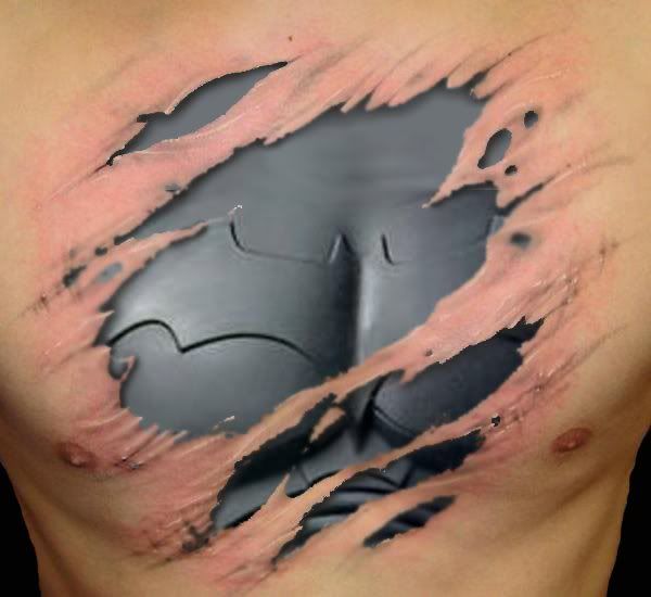 a man's chest covered in black ink