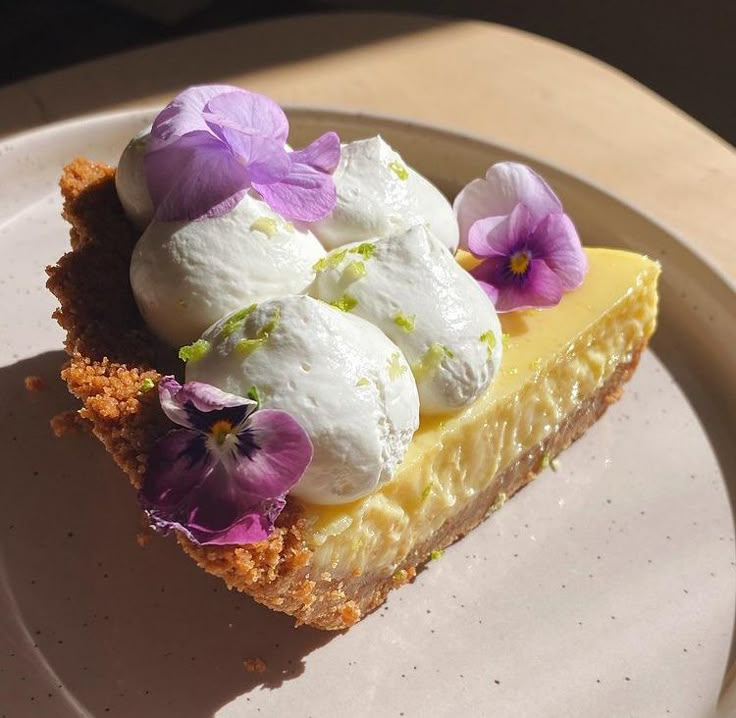 a piece of pie with flowers on top