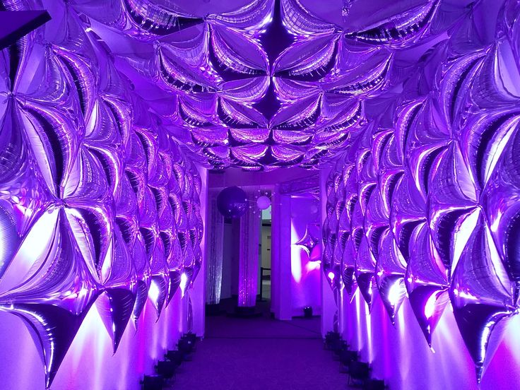 the inside of a room with purple lights