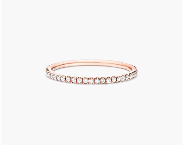 14K Rose Gold Single Row Ever After Diamond Ring. Delicately crafted in 14K rose gold, this single row diamond band is chic and timeless. Wear this simply beautiful band on its own or stack with other rings for a fashion forward look. Minimalist Rose Gold Diamond Eternity Band, Rose Gold Diamond Band In Fine Jewelry Style, Classic Rose Gold Stackable Rings With Brilliant Cut, Classic Stackable Rose Gold Diamond Ring, Rose Gold Stackable Rings With Half Eternity Band, Rose Gold Half Eternity Diamond Ring, Rose Gold Diamond Round Band, Rose Gold Diamond Round Cut Bands, Classic Everyday Rose Gold Diamond Ring