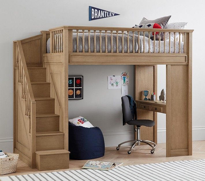 there is a loft bed with stairs to the top and desk below it, along with a computer chair