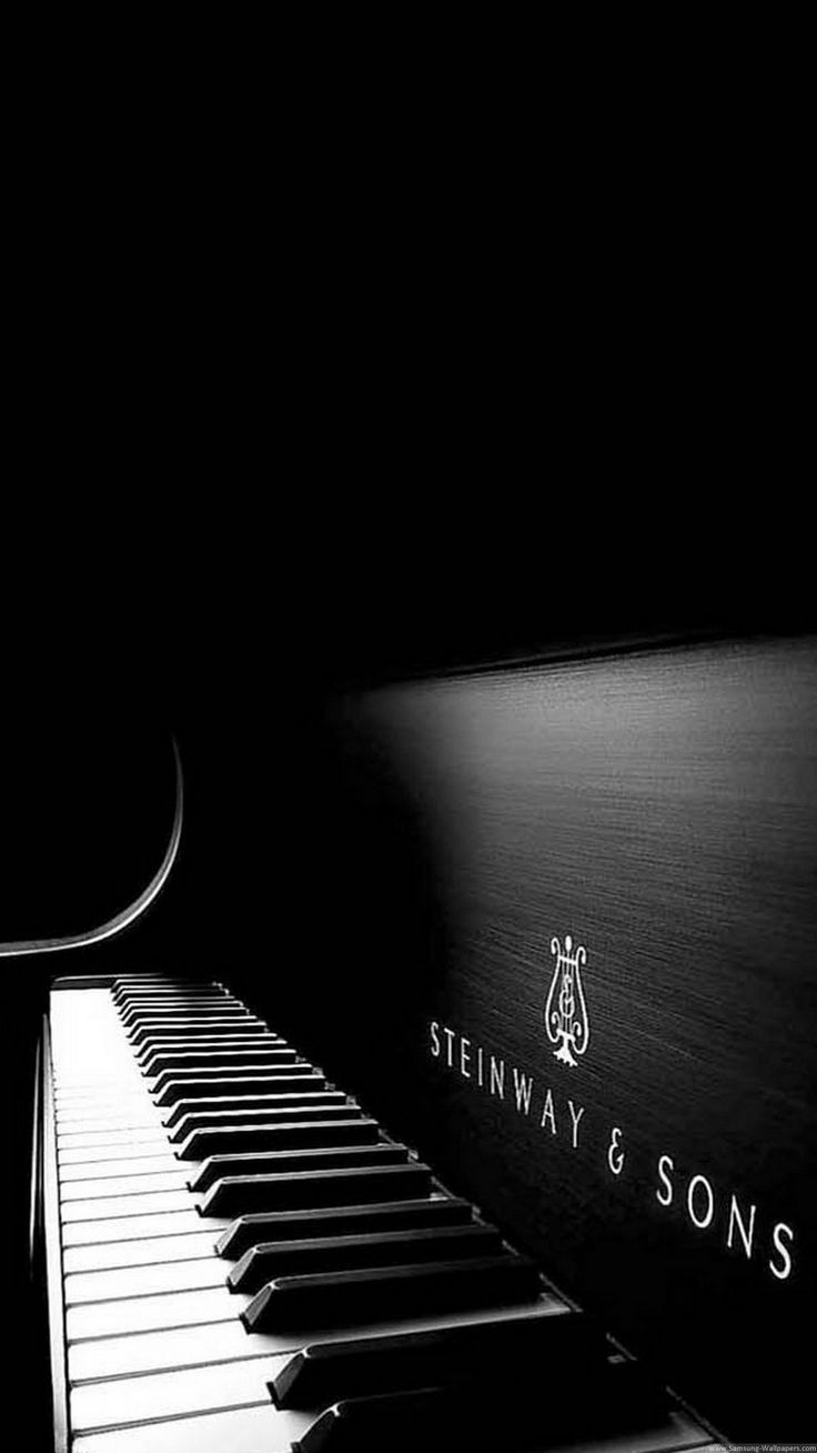 a black and white photo of a piano with the words, benway & sons on it