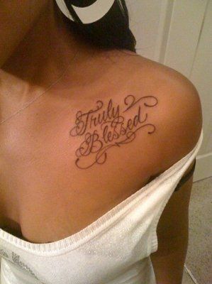 a woman with a tattoo on her shoulder that says truly befried below it