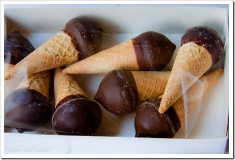 chocolate covered ice cream cones in a white box