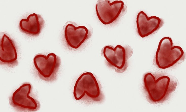 red hearts are arranged in the shape of heart shapes