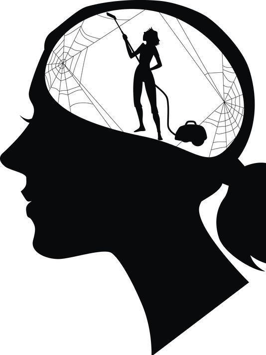 the silhouette of a woman with a spider web in her head, holding a broom