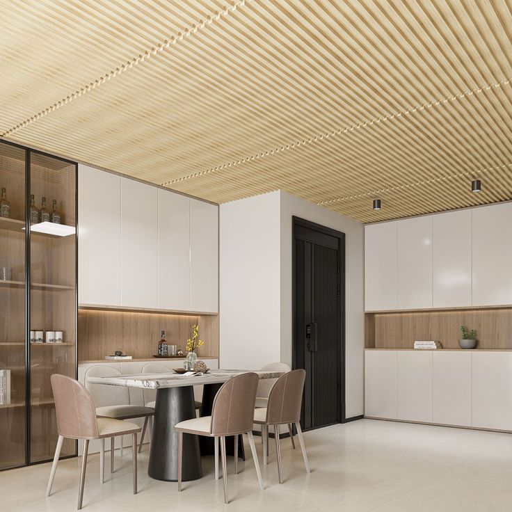 a modern kitchen with white walls and wooden ceiling