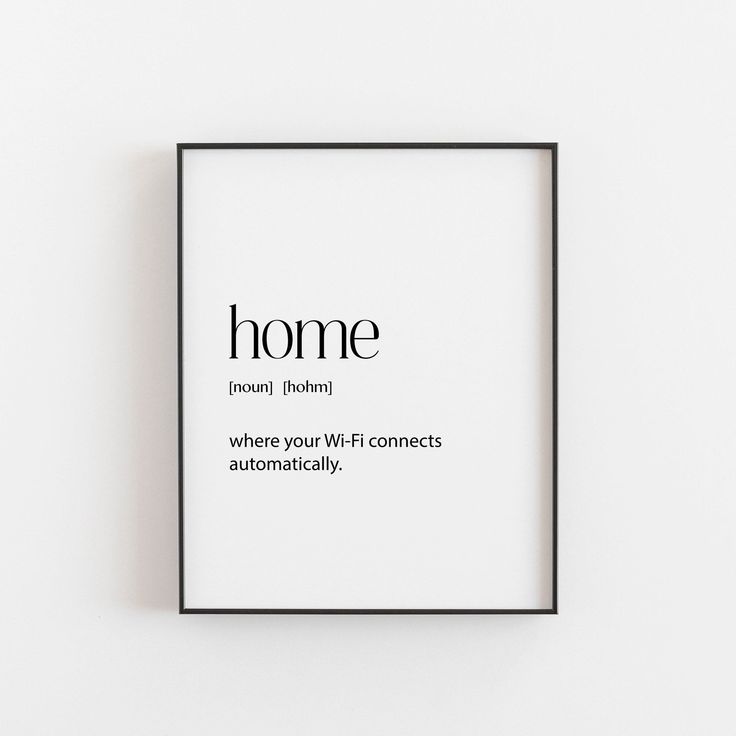 a black and white frame with the words home on it