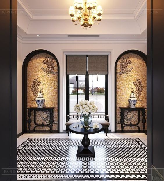 an elegant dining room with black and white tile flooring, chandelier and windows