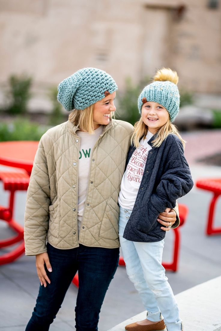 This women's blue chunky slouch beanie is a warm crochet hat for women and teens. A slouch style hat, made from premium wool blend yarn features a unique crochet stitch to create a trendy, slouch fit. This one size fits most teen/adult beanie makes the perfect hat gift. I designed this hat when I was in need of something to throw on as a new stay at home mom with three kids under the age of 4. I wanted a hat that was simple, effortless, and would allow me to skip doing my hair yet feel put together when running errands or to the school drop off. Construction: Hand crochet in the U.S.A Fiber: 80% acrylic & 20% wool How We Give: Each month, b.e.happe donates Wish List items to Child Life Services at children's hospitals across the country with a portion of the proceeds. Construction: Hand cr Crochet Slouchy Beanie, Knit Pom Pom Hat, Crochet Unique, Crochet Hat For Women, Knitted Heart, Slouch Beanie, Slouch Hat, Slouchy Beanie, Crochet Stitch