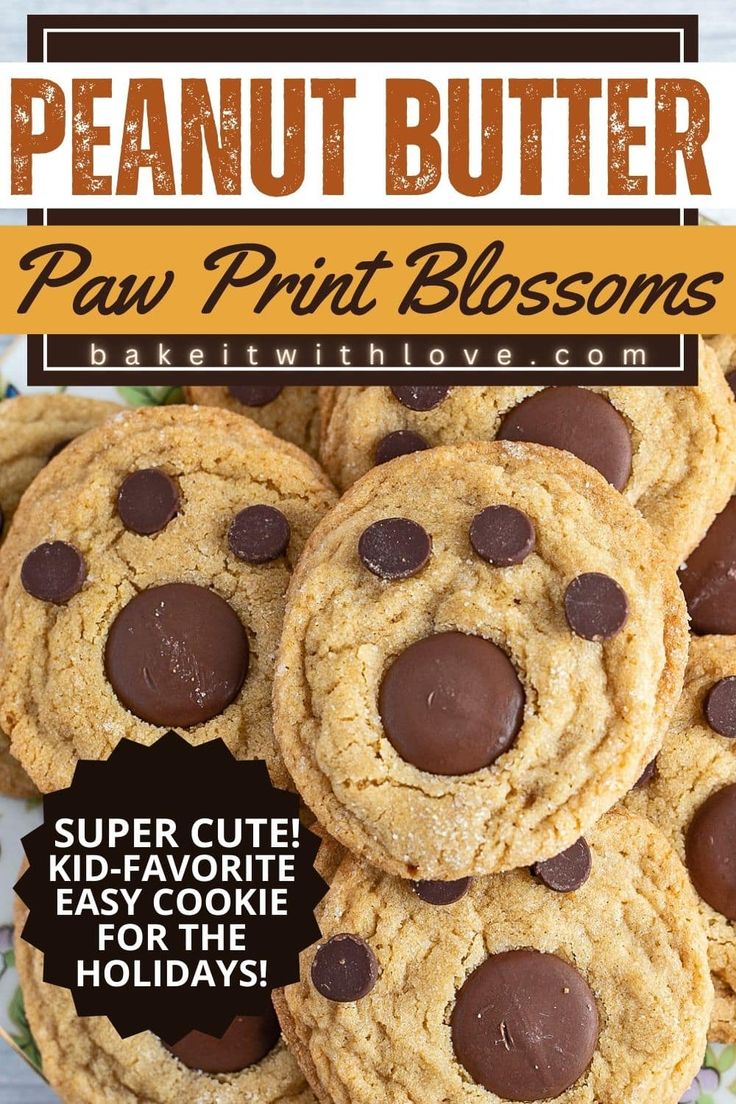 Cute peanut butter bear paw blossoms cookies stacked on a plate to enjoy. Pawprint Cookies, Dog Paw Peanut Butter Cookies, Peanut Butter Paw Cookies, Bear Claw Cookies, Peanut Butter Paw Print Cookies, Bear Claw Cookies Recipe, Paw Print Cookies, Bear Paw Cookies Recipes, Bear Paw Cookies