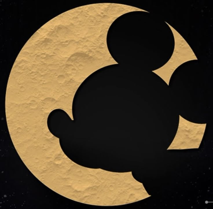 the silhouette of mickey mouse in front of a full moon with black and gold paint