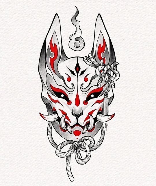 an animal mask with red and white designs on it's face, in the shape of a wolf