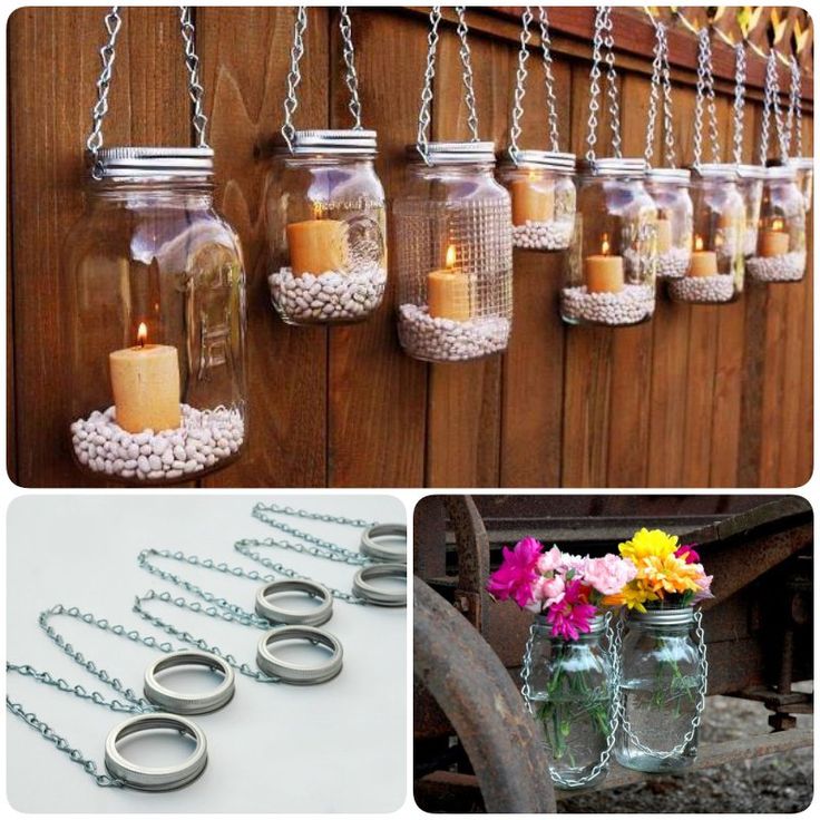 mason jars filled with flowers and candles hanging from chains