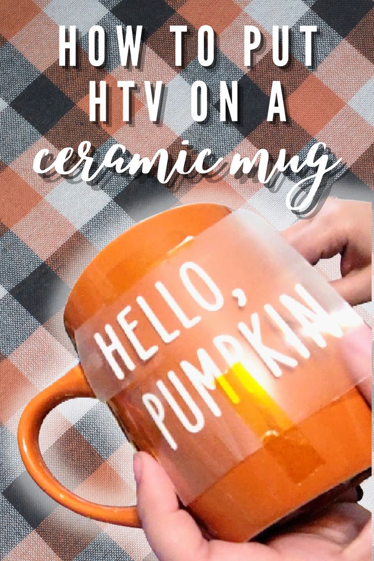 a person holding a coffee mug with the words hello pumpkin on it in white lettering