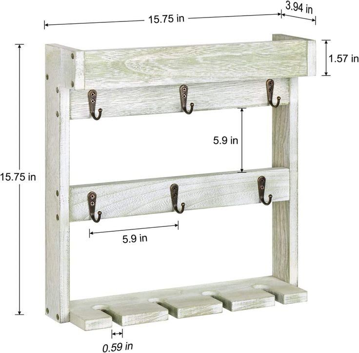 a white wooden shelf with hooks on it and measurements for the top two shelves in front