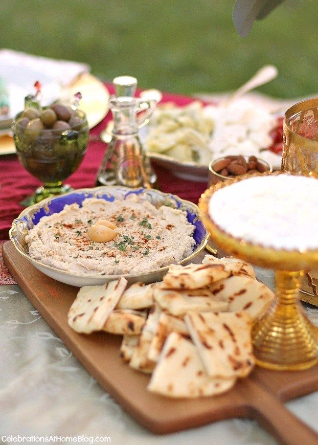 an assortment of food sitting on a table