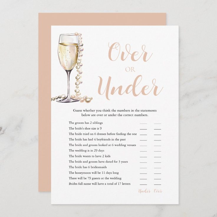 a card with the words over or under written on it and a glass of wine