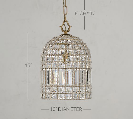 a chandelier hanging from a chain with measurements for the size and width in front of it