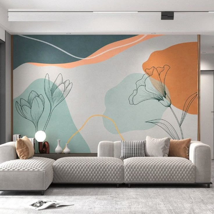 a modern living room with an artistic wall mural