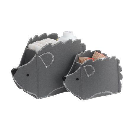 two gray fish shaped storage containers with toothbrushes in them and one has a bottle on it