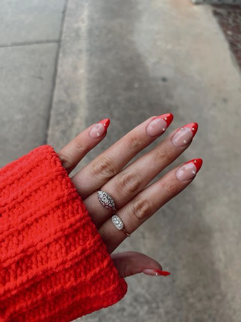 Winter Nails Blue French Tip, Red Christmas Nails With Pearls, Red French Tip Nails Almond With Pearls, Red French With Diamonds, Red French And Pearls, Summer Red French Nails, Red French Pearl Nails, Red Tips Short Nails, Christmas And New Year Nail Ideas