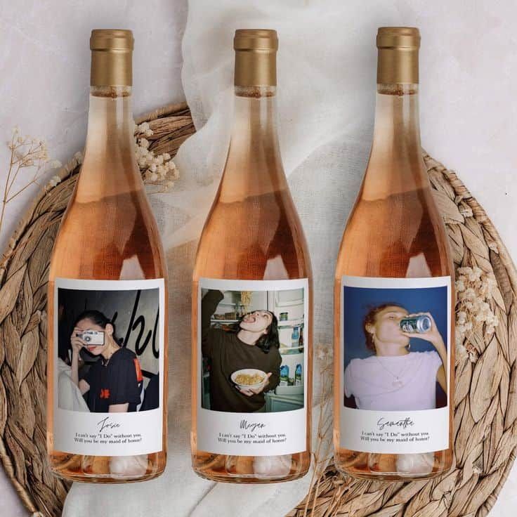 three bottles of wine sitting next to each other