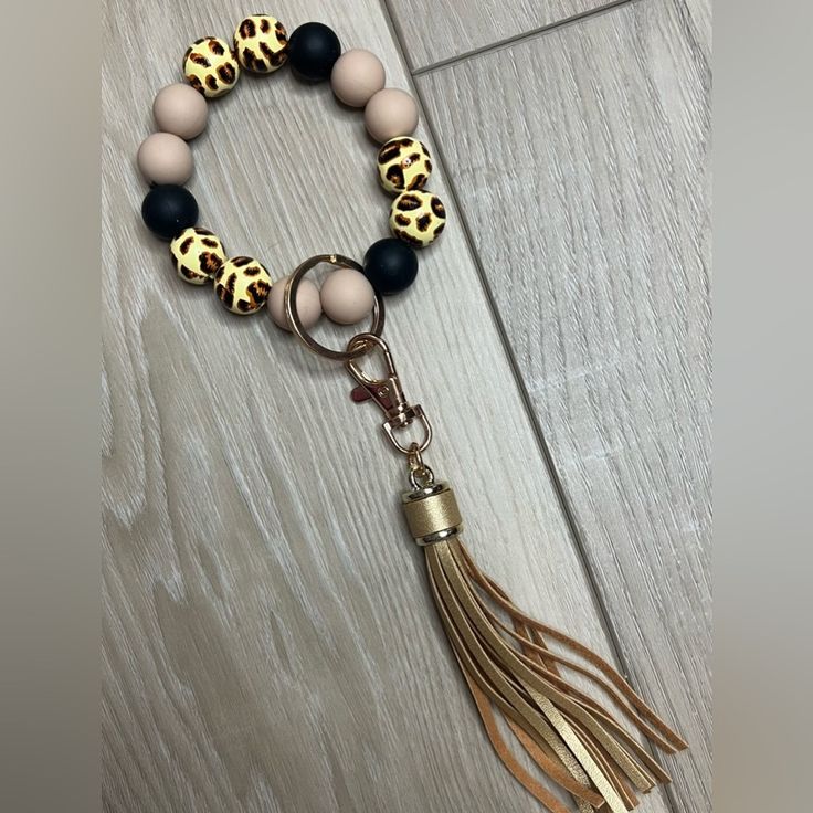 Nwt Wood Bead, Leopard Print Keychain With Tassel And Gold Accessories. Attach To Keys, Airpods, A Bag Etc. Super Cute! Keychain With Tassel, Tassel Bag Charm, Camo And Pink, Tassel Keychain, Tortoise Sunglasses, Tassel Bag, Gold Accessories, Beaded Tassels, Women Wrist Watch