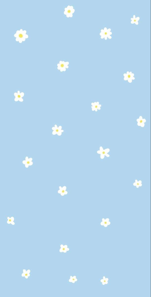 a blue background with small white flowers on it