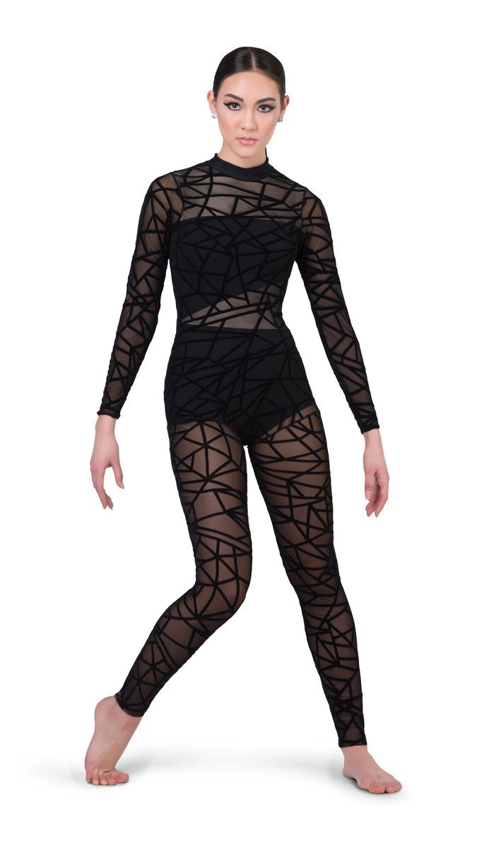 a woman in black bodysuit with sheer mesh on the sides and one leg up