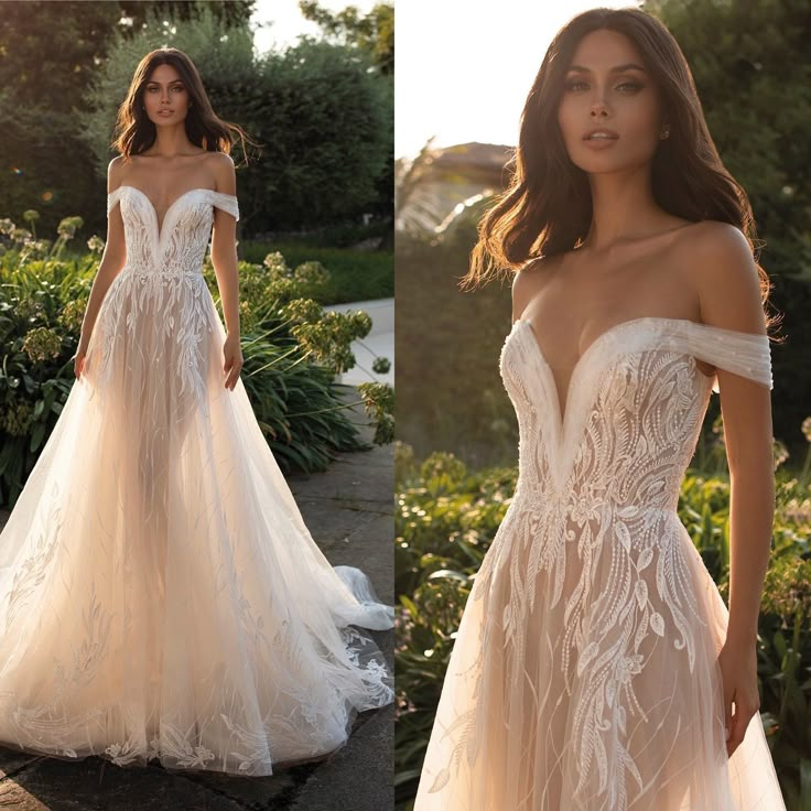 a woman in a wedding dress standing next to bushes