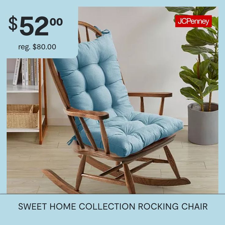 a wooden rocking chair with blue cushions for $ 52 00 reg $ 480 00 from jcheney