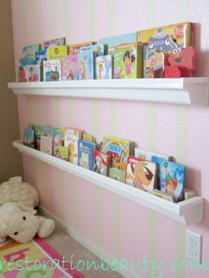 two white shelves filled with children's books