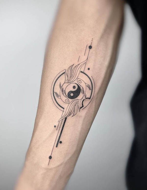 a person's arm with a tattoo on it that has an eye in the center