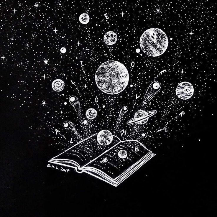 an open book with planets flying out of it