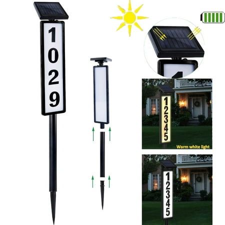 the solar powered lawn light is on display in front of a house with two pictures