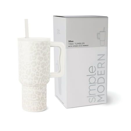 a white coffee cup with a straw in it next to a cardboard box on a white background