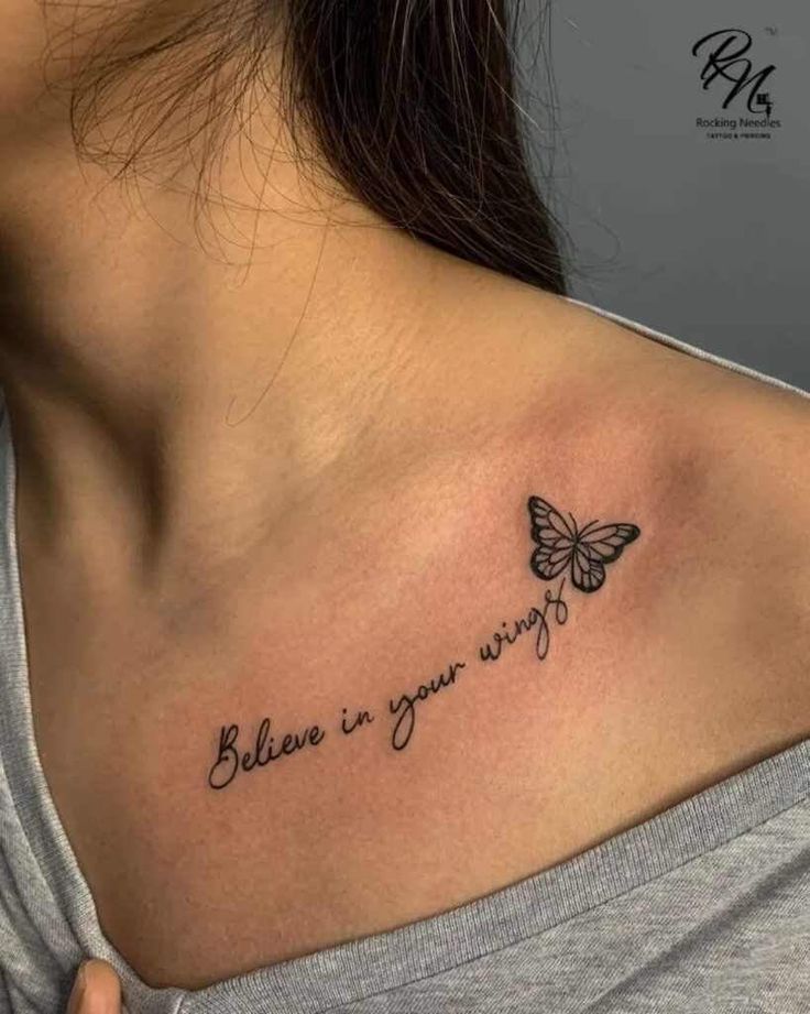 a woman with a butterfly tattoo on her shoulder that says, believe in your wings