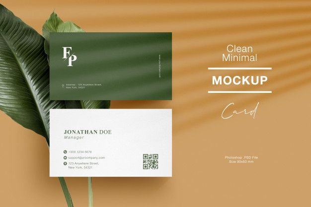 a close up of a plant with a business card in front of it that says clean minimal mockup